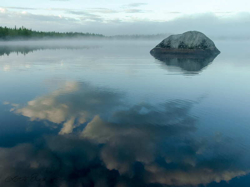 SE_lake_watersurface_tranquil_cloudreflections_rock