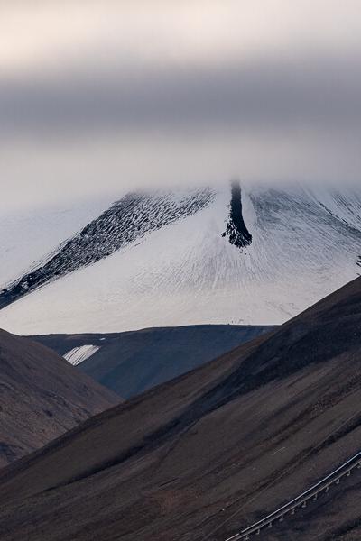 Svalbard Snowcovered Mountain Cloud Foreground Black Mountains Cablecarline900 Svalbard Snowcovered Mountain Cloud Foreground Black Mountains Cablecarline900