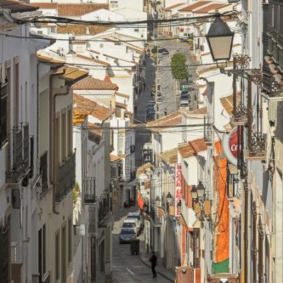 Downwards and very upwards, narrow street in a hilly Spanish village Es Street Downwards Upwards Narrow