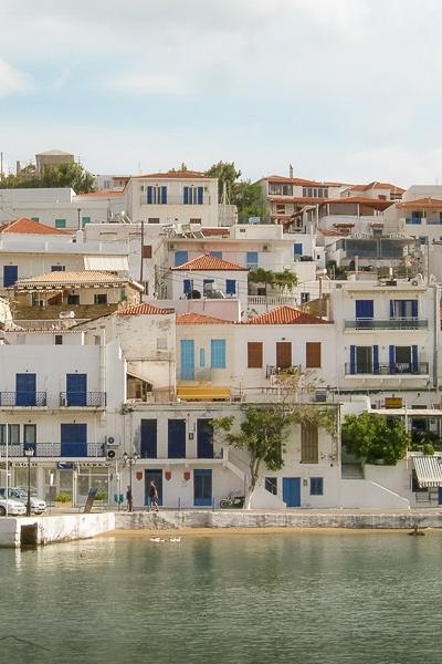 Whitewashed houses climbing uphill by the bay on Andros, Greece Gr Climbing Town Whitewashed Houses Street Quay