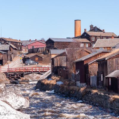 Old wooden houses by the river in the coppermining town of Røros, Norway No Rros River Coppermining Old Wooden Houses Street