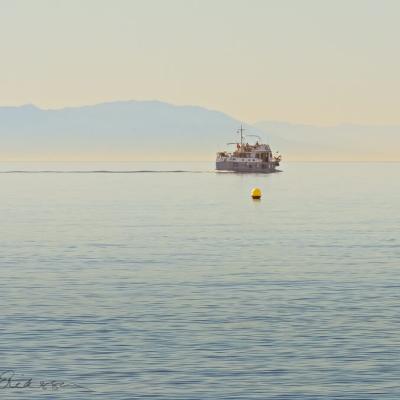 Spain Mediterranean Yellow Buoys Boat Haze Background Mountains900