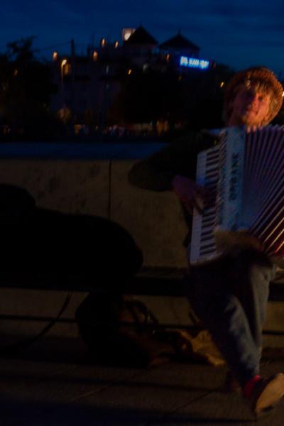 A man playing romantic melodies on his accordion a warm night in Cordoba, Spain 31mars17 Nikon 212243