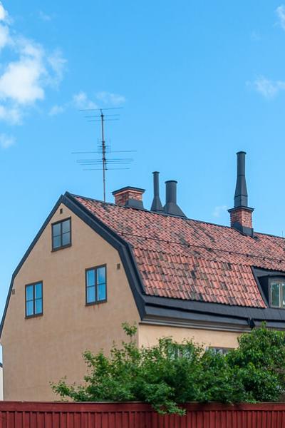 Se Stockholm Colours Chimneys Churchtower Blue Sky900